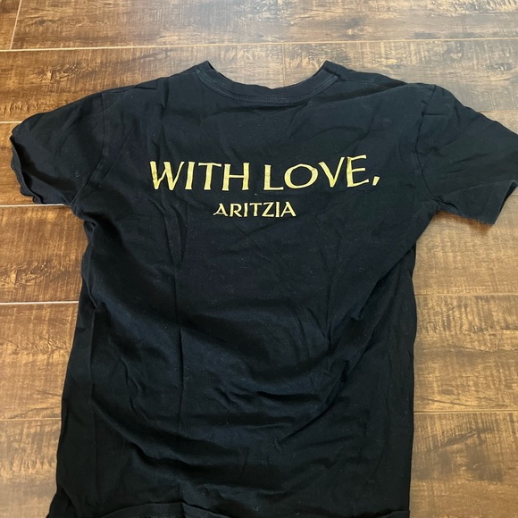 aritzia community care program black and gold t-shirt - Picture 3 of 3